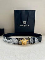 Versace belt with black-and-gray patterned strap and gold-tone Medusa buckle