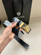 Versace belt with black strap, gray pattern, and gold-tone square Medusa buckle