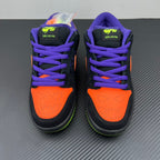 Pair of low-top sneakers, purple laces and heel panels, orange accents, black soles.