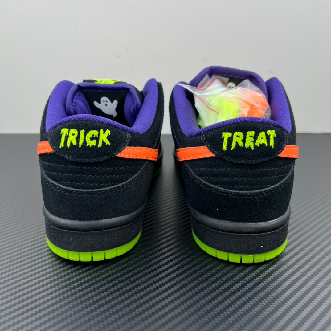 Sneaker heels with 'TRICK' and 'TREAT' on purple cuffs, orange side stripe, black uppers.