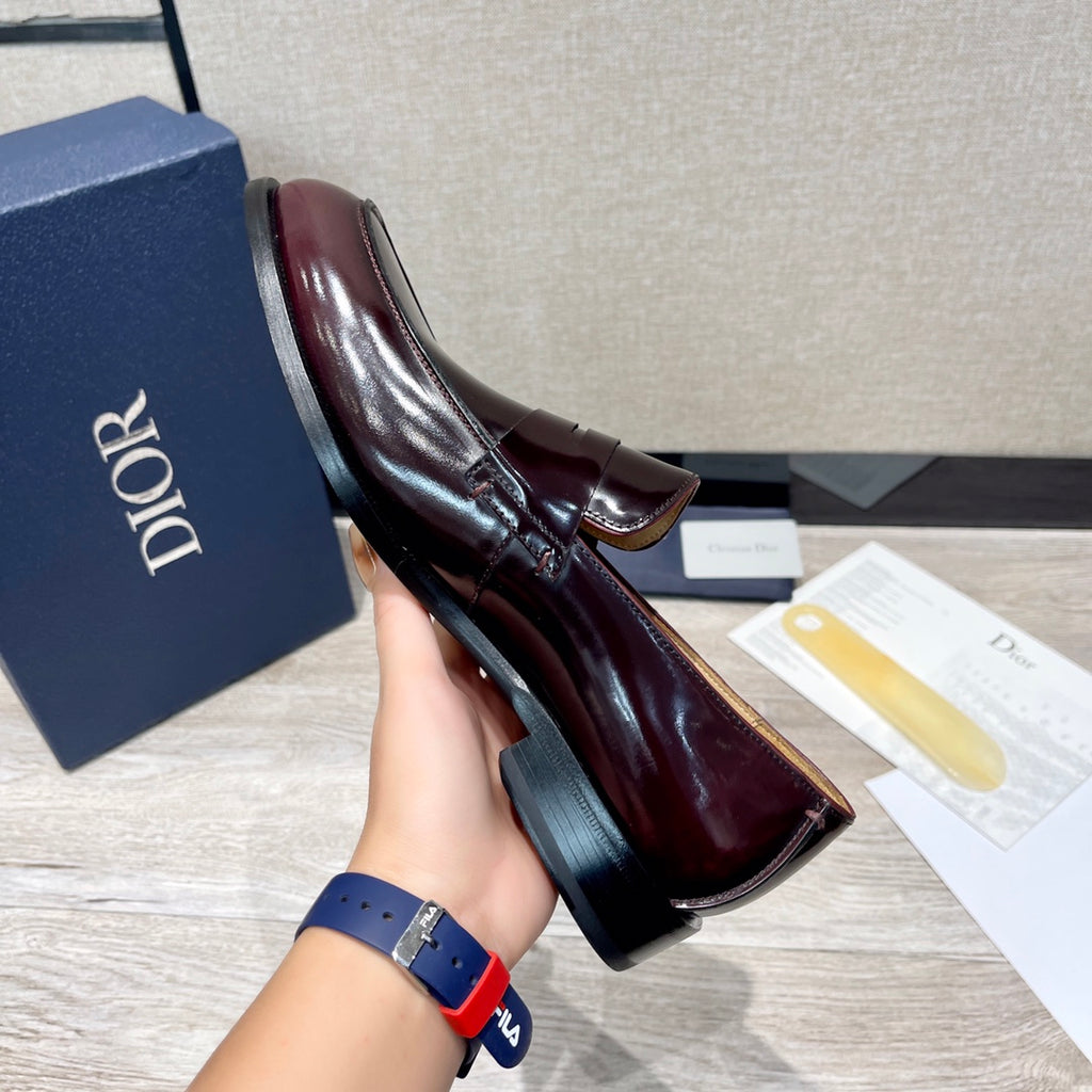 Dior unisex patent leather loafer, dark burgundy slip-on on foot