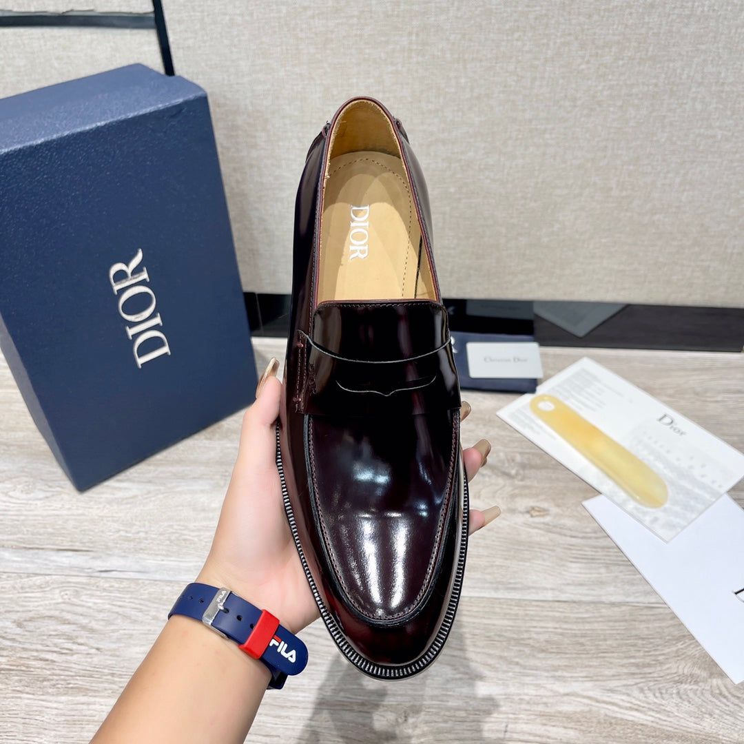 Dior unisex patent leather loafer, dark burgundy front view with logo-lined insole