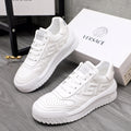 Versace white leather sneakers with lace-up front and logo details