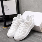 Versace white leather sneakers, pair with lace-up and logo on tongue