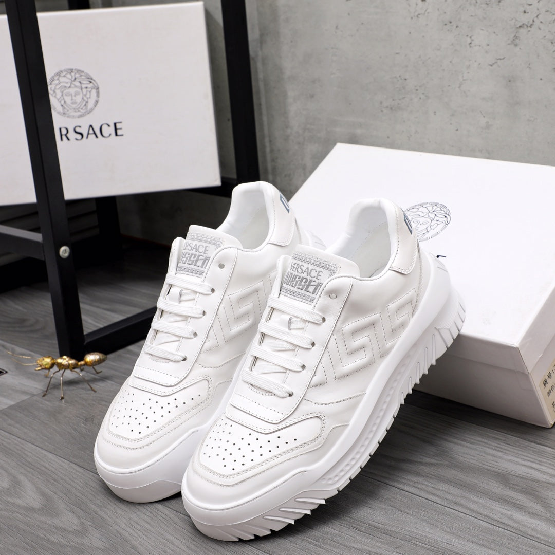 Versace white leather sneakers, pair with lace-up and logo on tongue
