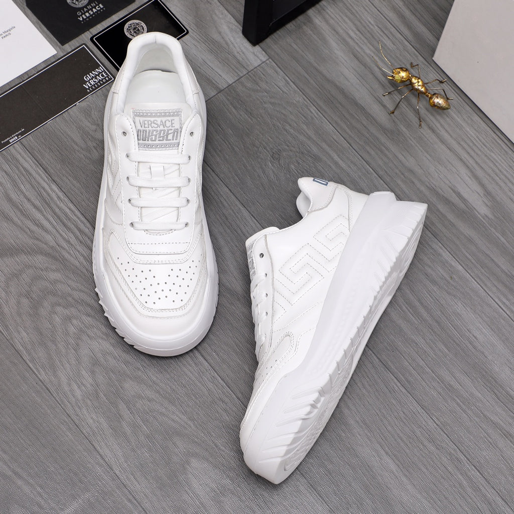 Versace white leather sneakers, front and side views with chunky sole