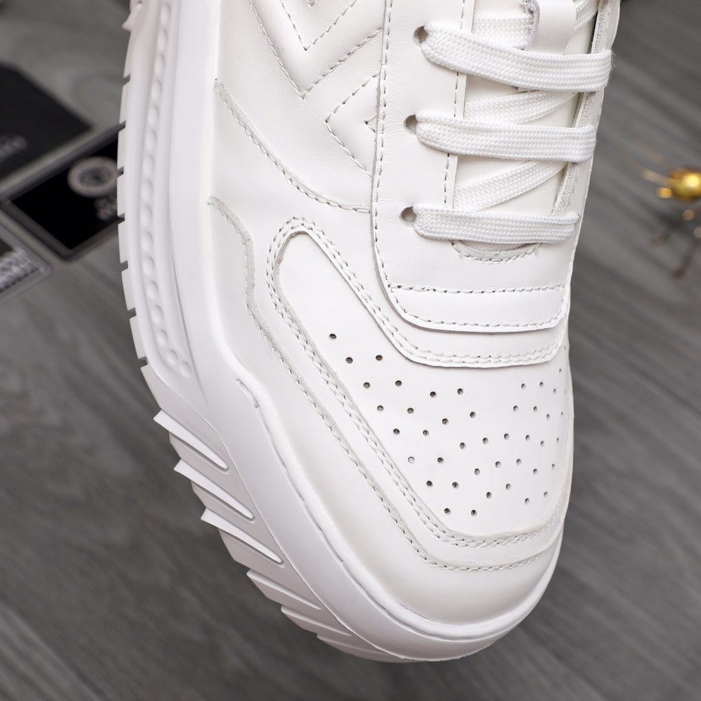 Versace white leather sneaker toe with perforations and stitched panels