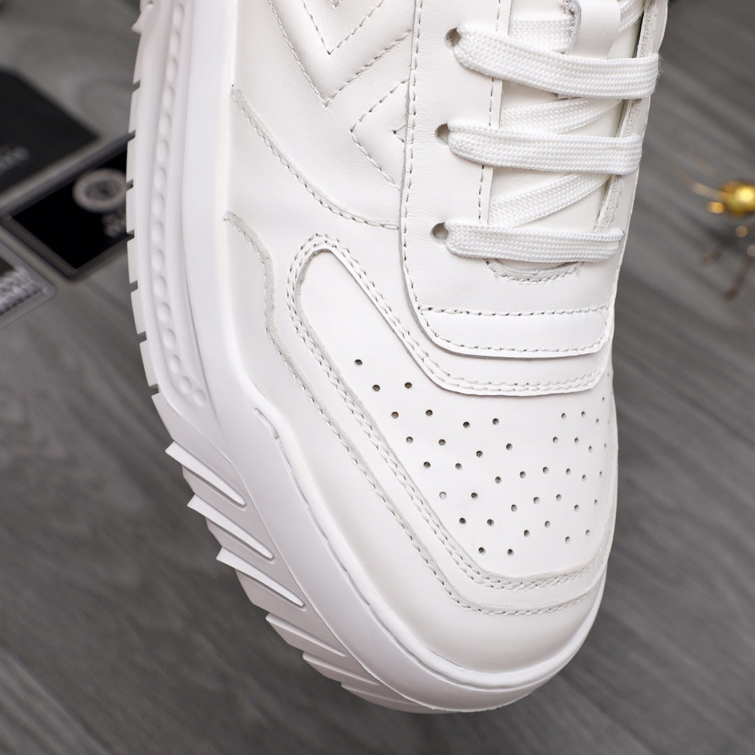 Versace white leather sneaker toe with perforations and stitched panels