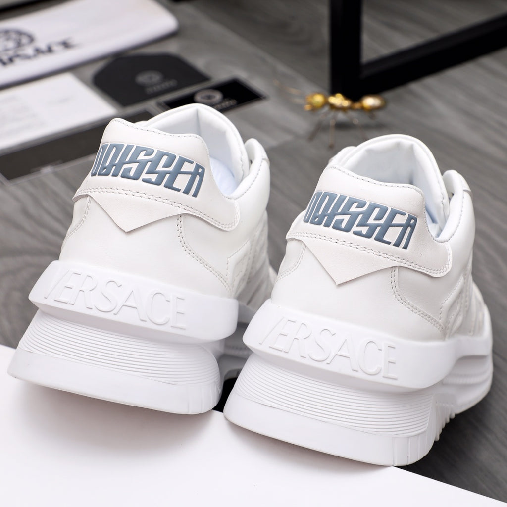 Versace white leather sneakers, rear view with embossed logo on heel