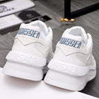 Versace white leather sneakers, rear view with embossed logo on heel