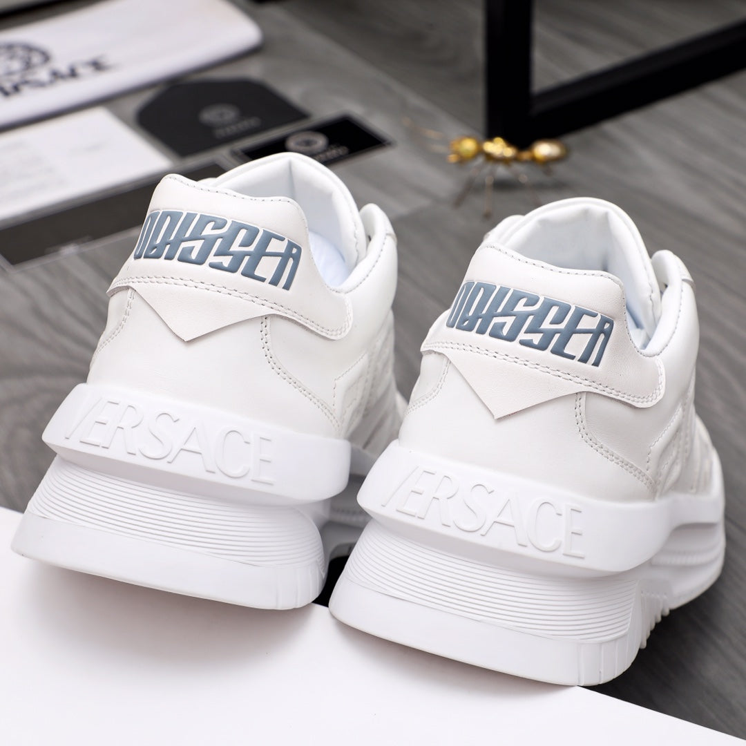 Versace white leather sneakers, rear view with embossed logo on heel