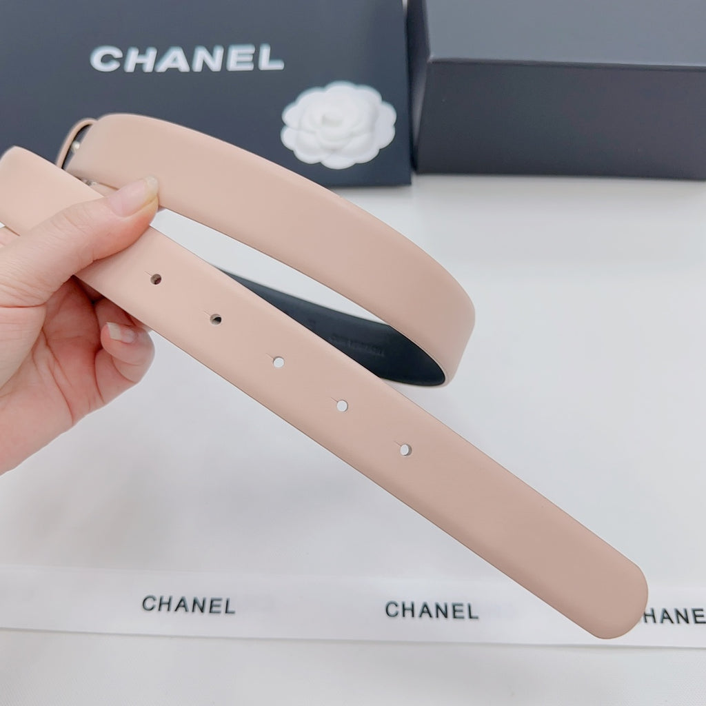 Light pink leather belt strap with multiple adjustment holes