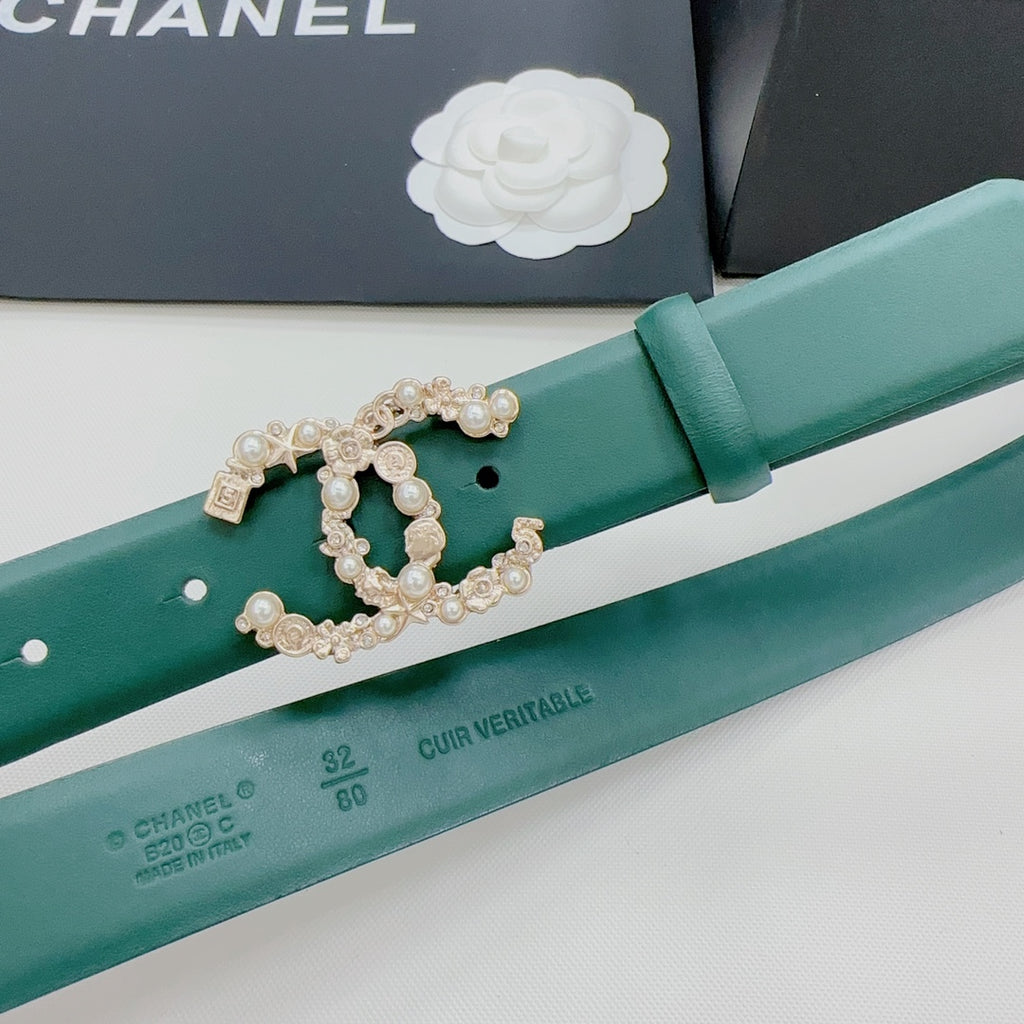 Green Chanel belt close-up with perforated holes and gold pearl buckle detail