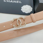 Beige Chanel belt with gold-tone jeweled buckle and pearl accents