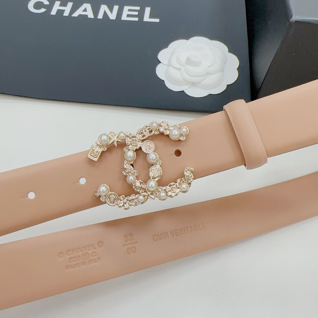 Beige Chanel belt with gold-tone jeweled buckle and pearl accents