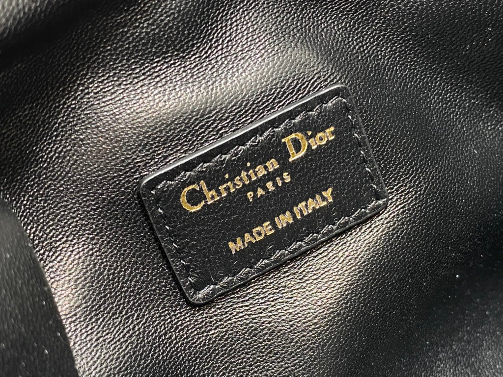 Leather Dior label reading Christian Dior Paris and MADE IN ITALY