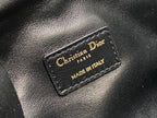 Leather Dior label reading Christian Dior Paris and MADE IN ITALY