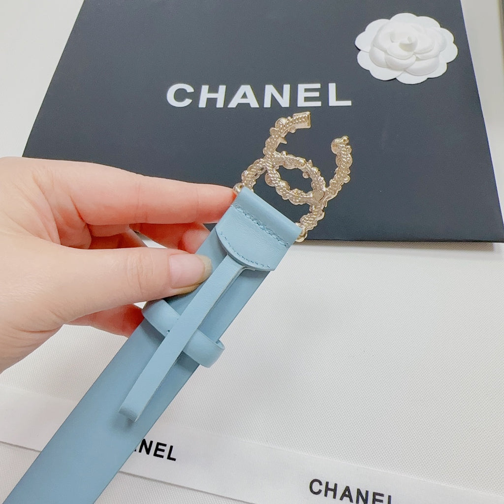 Light blue belt with gold-toned interlocking CC buckle detail