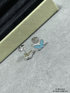 Butterfly stud earrings set: one heart-and-butterfly design, blue enamel and silver-tone.