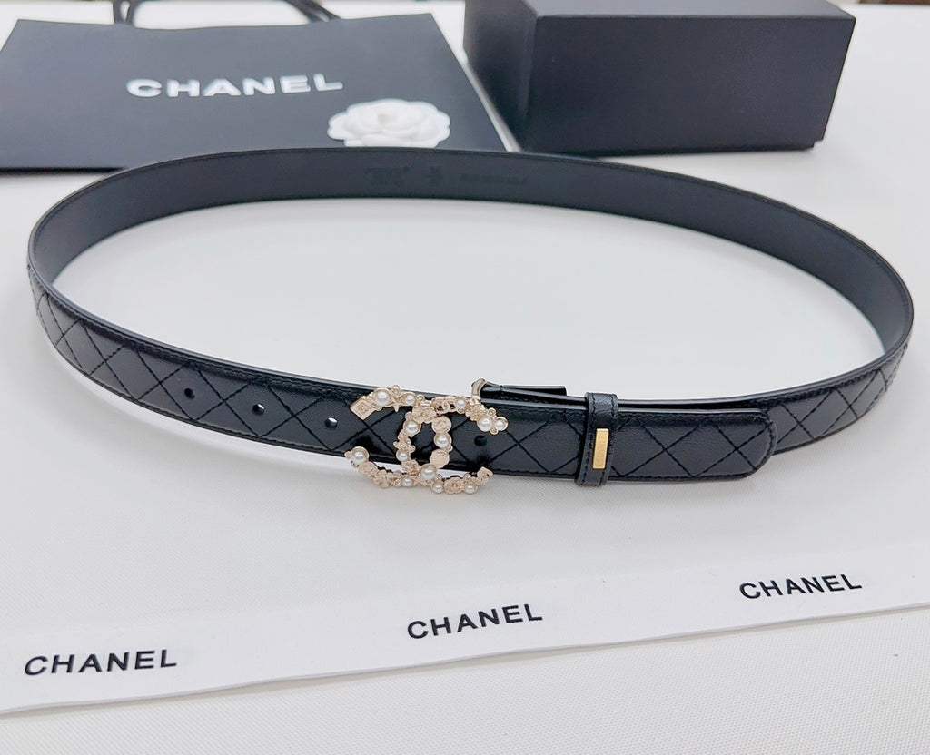 Chanel belt, dark quilted strap with gold buckle and pearl-embellished floral clasp