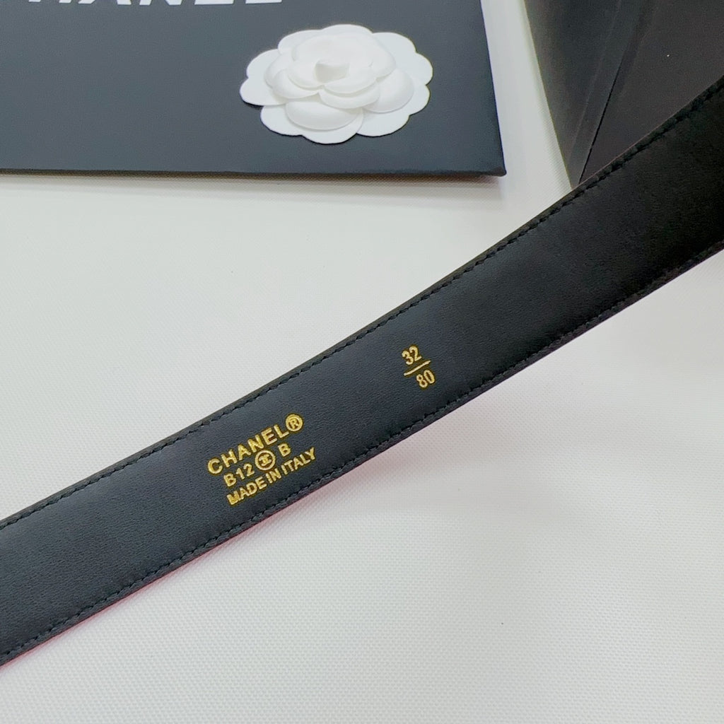 Chanel black belt strap with gold text 'CHANEL MADE IN ITALY' and size 32/80