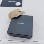 Beige Chanel belt with gold buckle and rhinestone CC floral embellishment