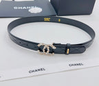 Chanel leather belt with quilted texture, gold buckle, and pearl-and-crystal decorative clasp