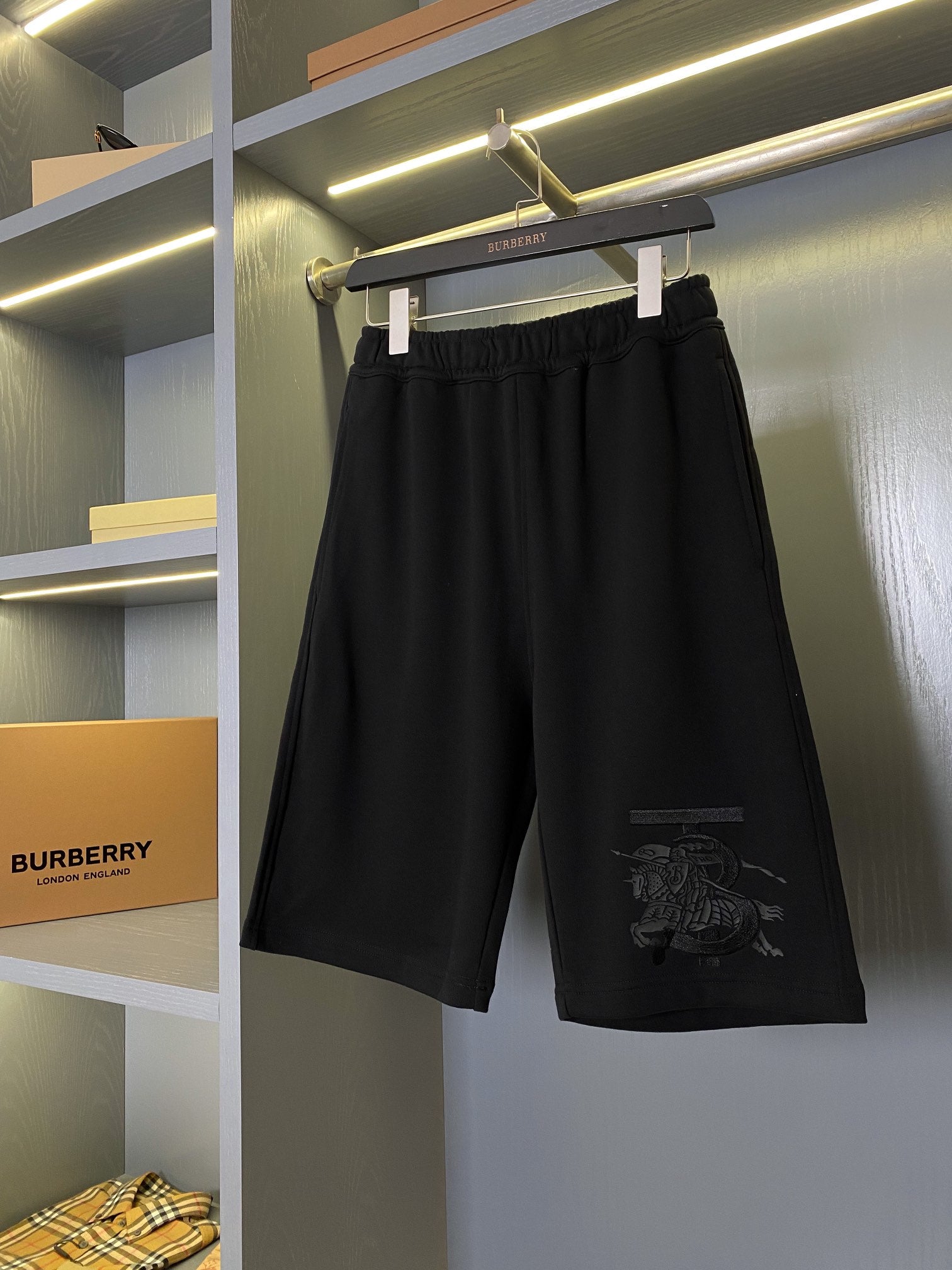 Black Burberry shorts with elastic waistband and side pockets