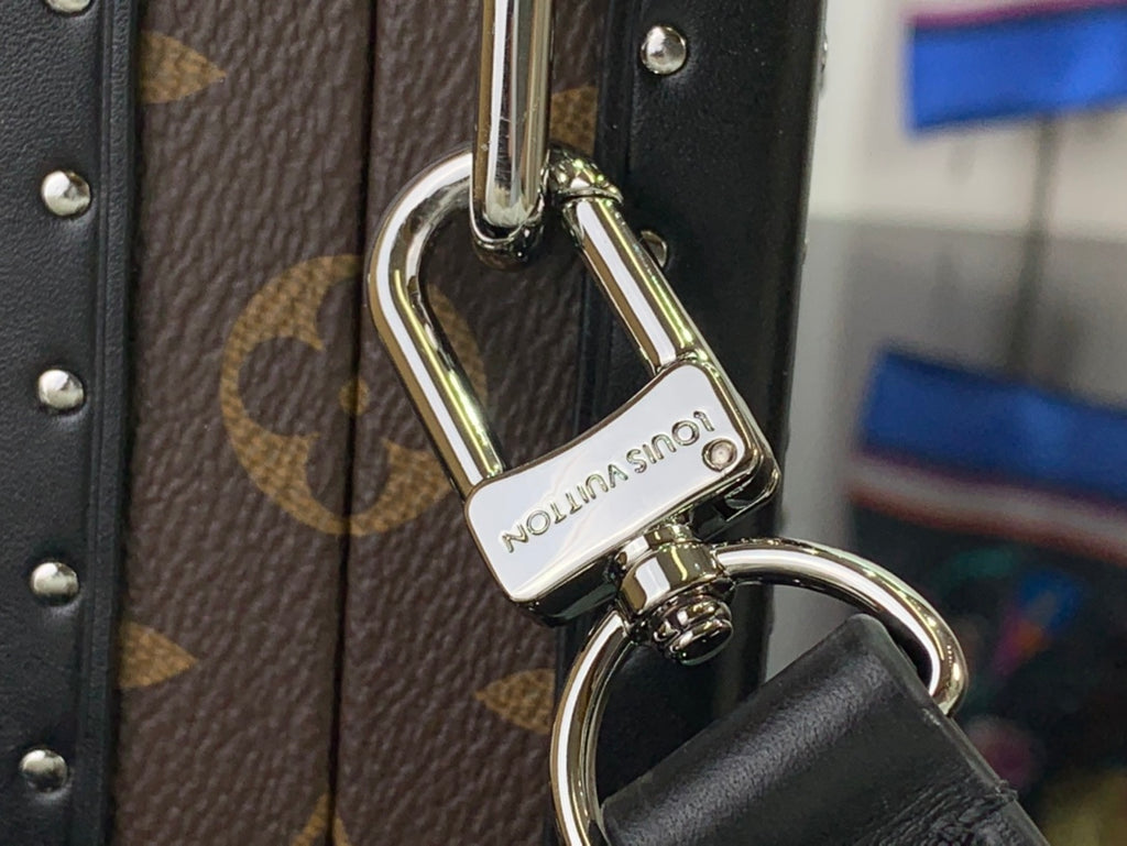 Louis Vuitton bag keyring with silver padlock and engraved branding