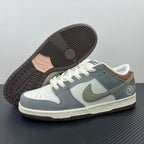 Low-top sneakers outsole view with brown traction tread and cream midsole