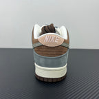 Back view of light blue and brown low-top sneakers with white laces and NIKE heel tab