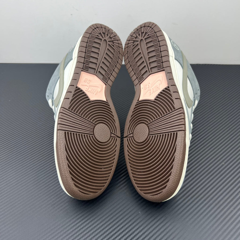 Two low-top sneaker soles with brown traction tread patterns