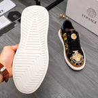 Versace sneakers outsole view, white rubber sole with textured tread, side profile