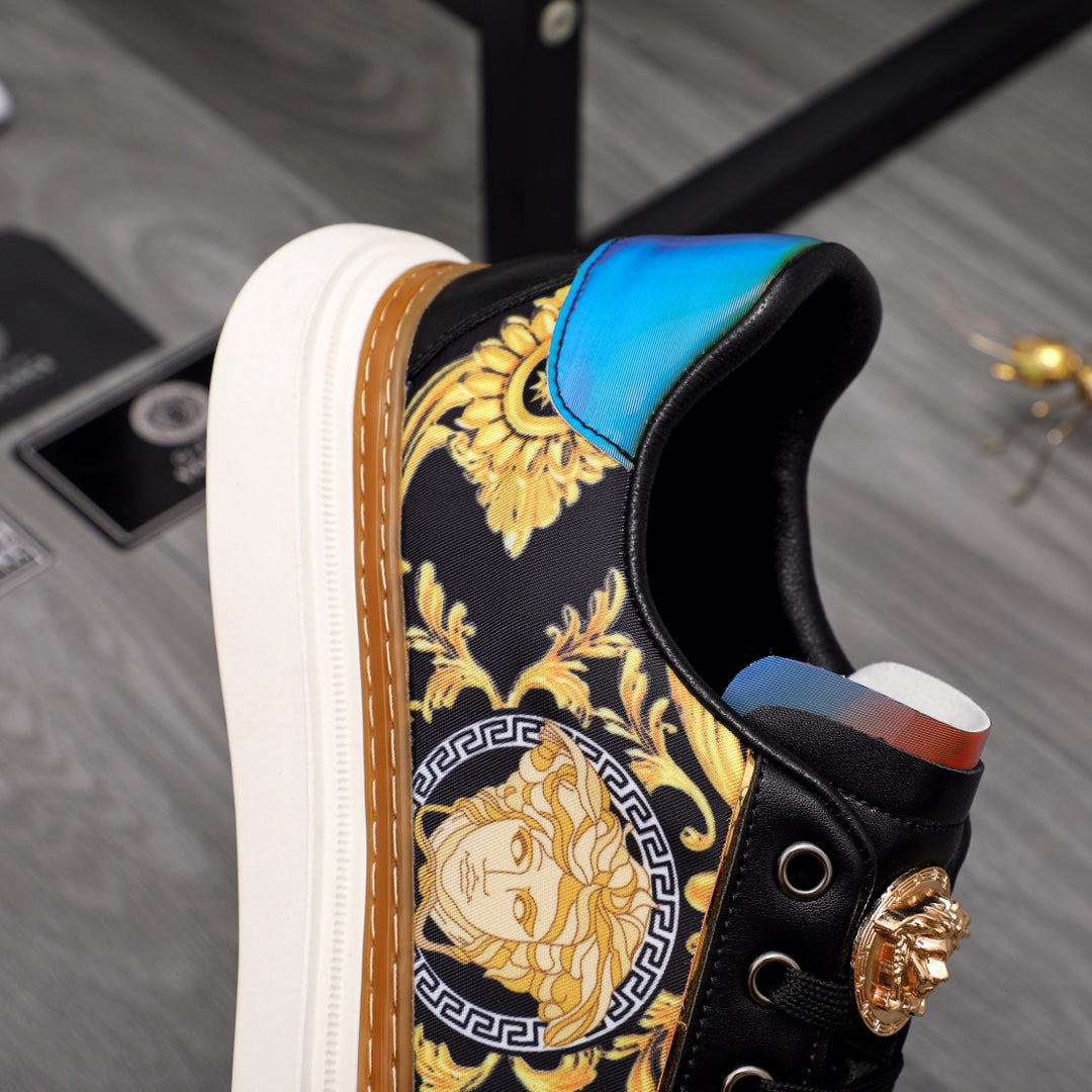 Versace sneakers detail, black with gold baroque pattern and blue leather heel panel