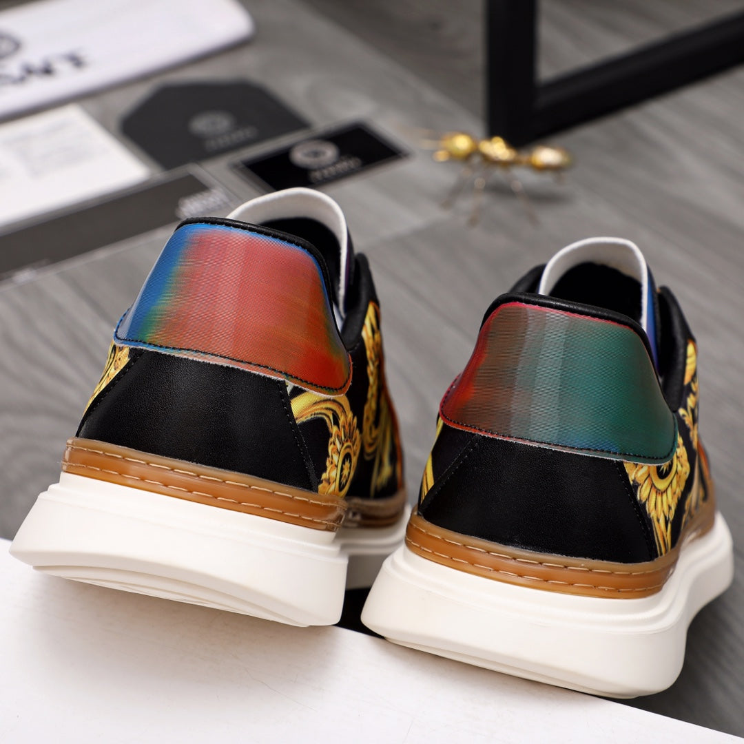 Versace sneakers rear view, black uppers with gold print and rainbow heel panels