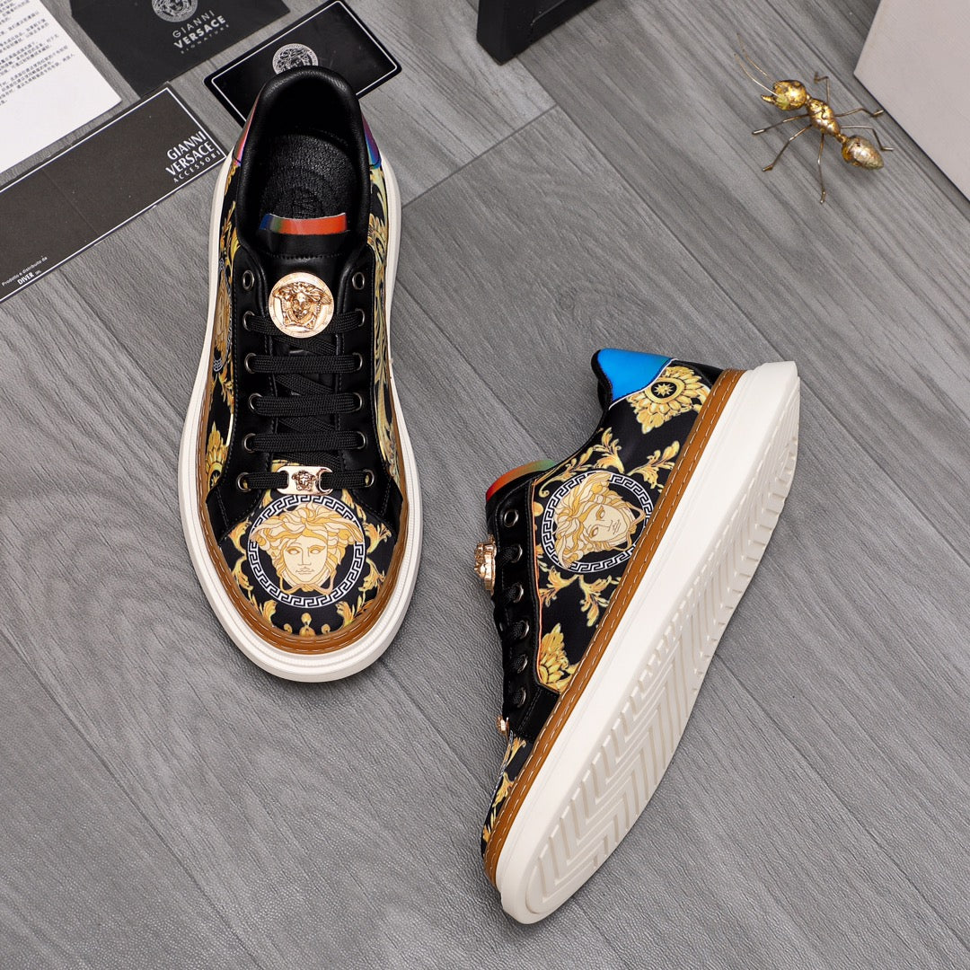 Versace sneakers, black with gold baroque logos and blue heel panel, side view