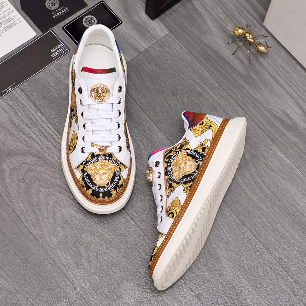 Low-top sneakers with white uppers, gold medallion, baroque print and tan-brown sole