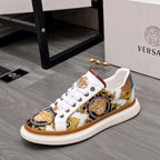 Low-top sneakers, white with gold medallion and baroque gold, blue and brown prints