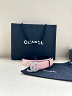 Chanel pink leather belt with silver CC buckle centered on strap