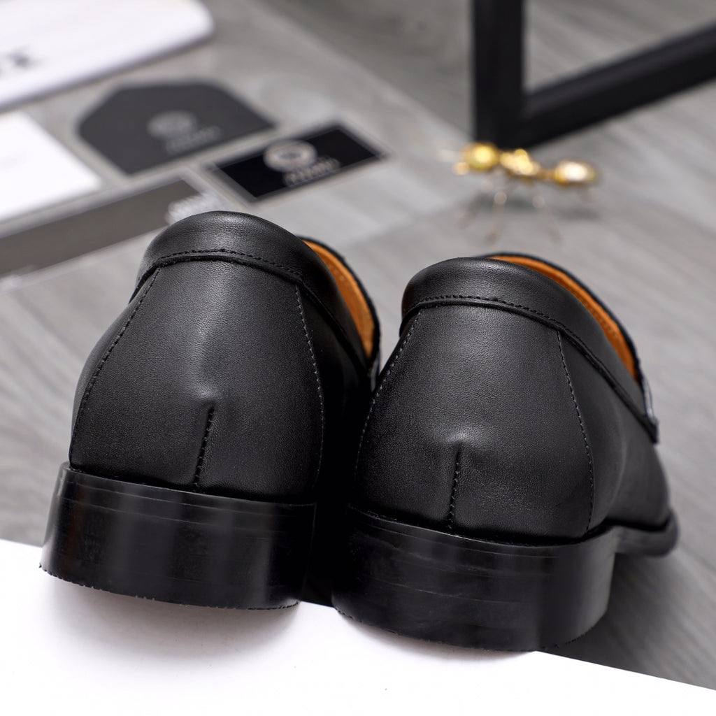Men's Versace black leather loafers from back, rounded heel and tan lining