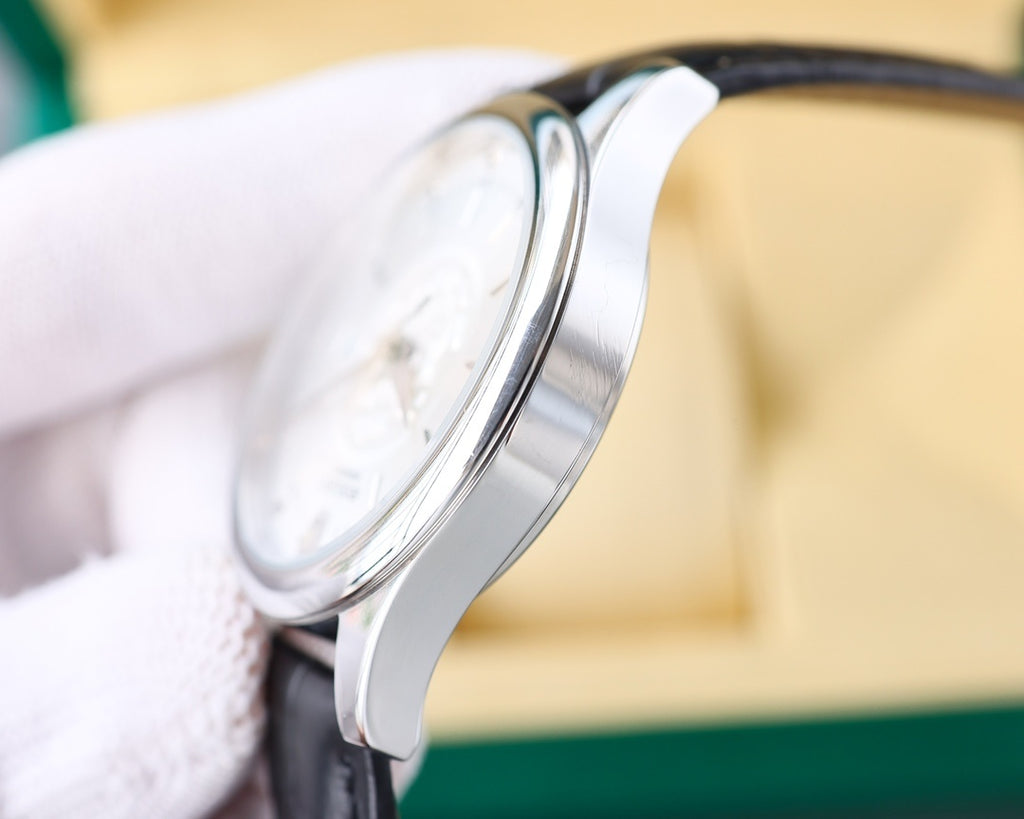 Rolex watch side view, stainless case, black leather strap, crown detail
