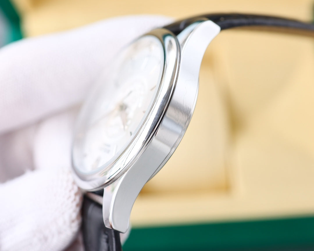 Rolex watch side view, stainless case, black leather strap, crown detail
