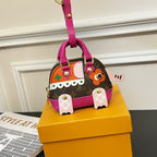 Small Louis Vuitton bag with brown monogram, pink handles, colorful front patches