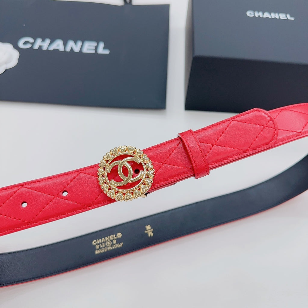 Red Chanel belt close-up: gold CC buckle on quilted leather strap and clasp