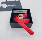 Red Chanel belt in box with gold CC buckle, quilted leather strap and long tail