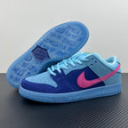 Low-top sneakers showing patterned light-blue outsole and heel with pink accent.