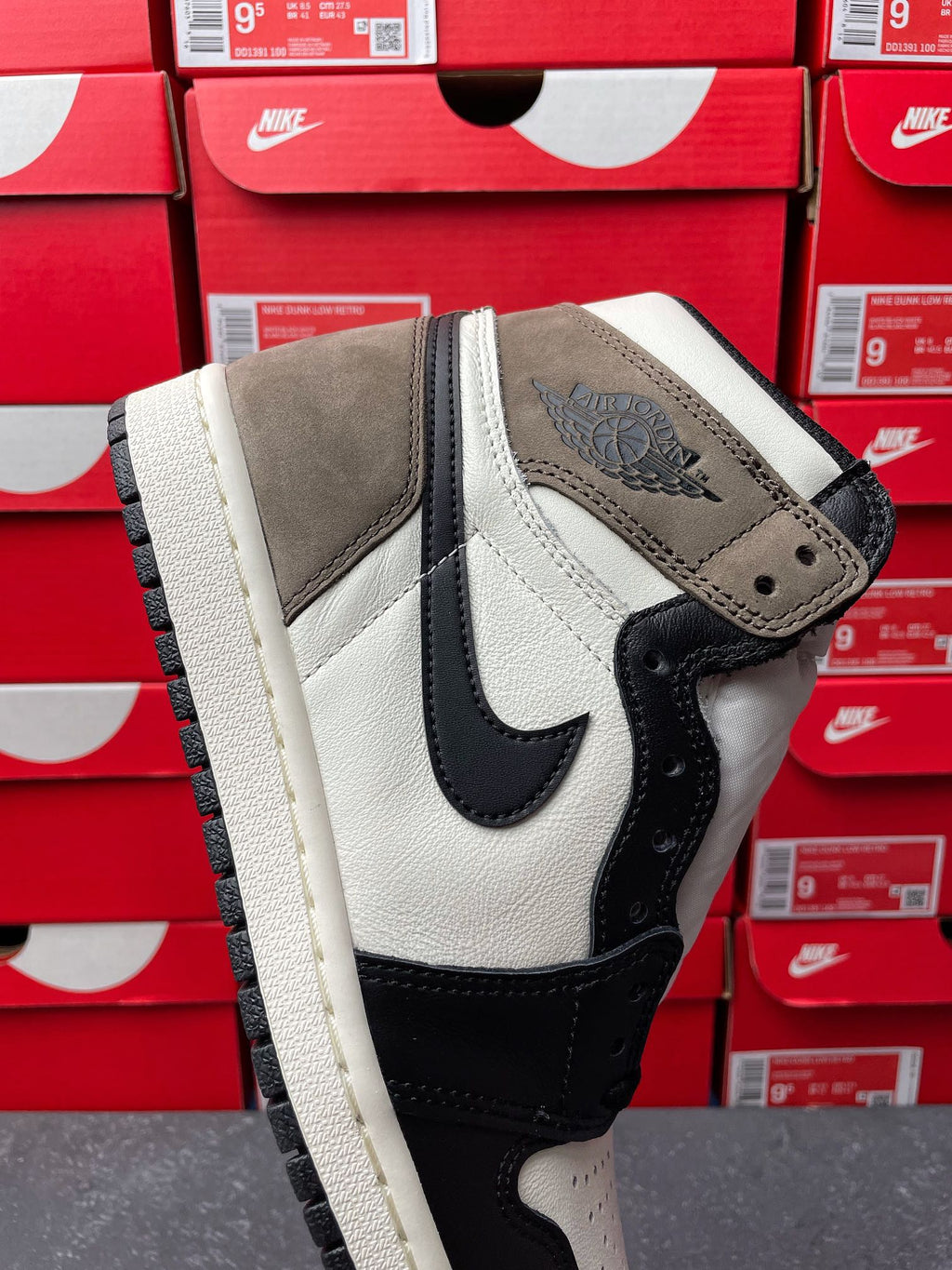 High-top sneakers, close side view, white upper with dark navy/black trim and suede panels