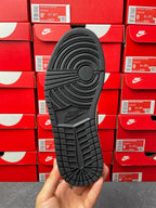 High-top sneakers outsole view, textured rubber tread with Nike logo branding
