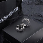 Chrome accessory ring pair, silver-tone rings with floral engravings on the bands