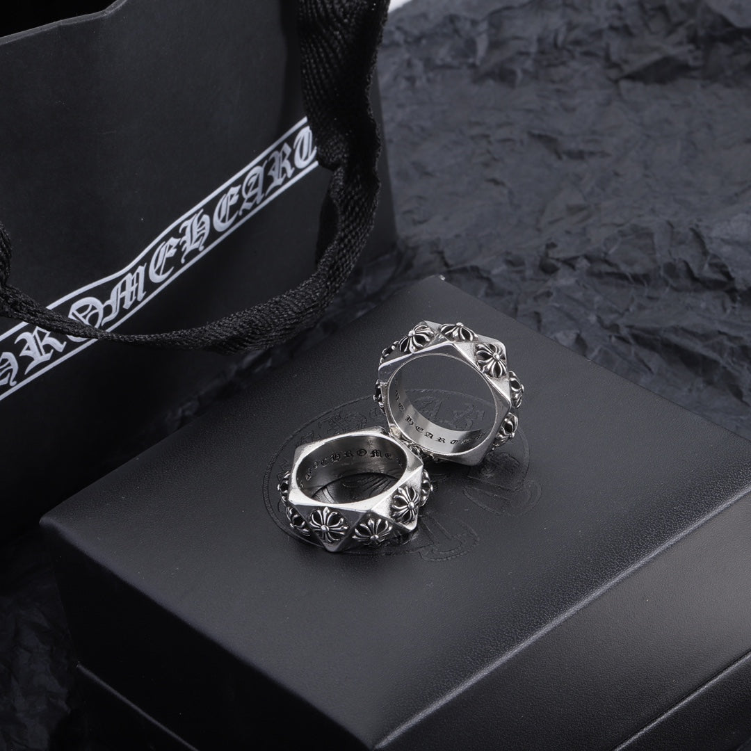 Chrome accessory ring pair, silver-tone rings with floral engravings on the bands